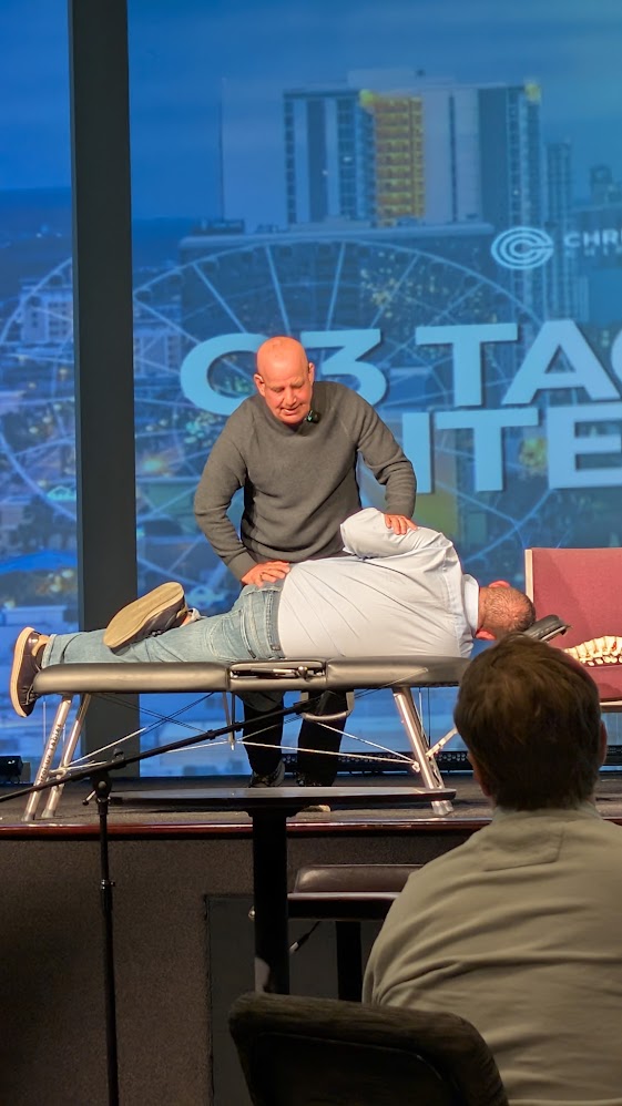 Live clinical demonstration on stage at a C3 Orlando gathering