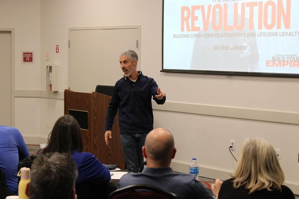 Dr. Erik Lerner teaching retention and loyalty to the C3 room